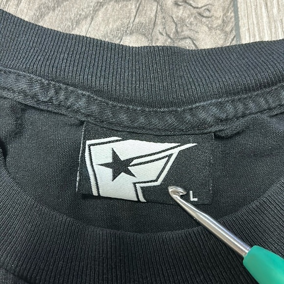 Famous Y2K Stars and Straps T-Shirt - Picture 5 of 7